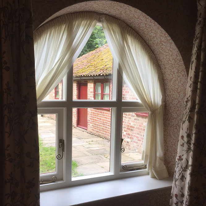 view of arched window